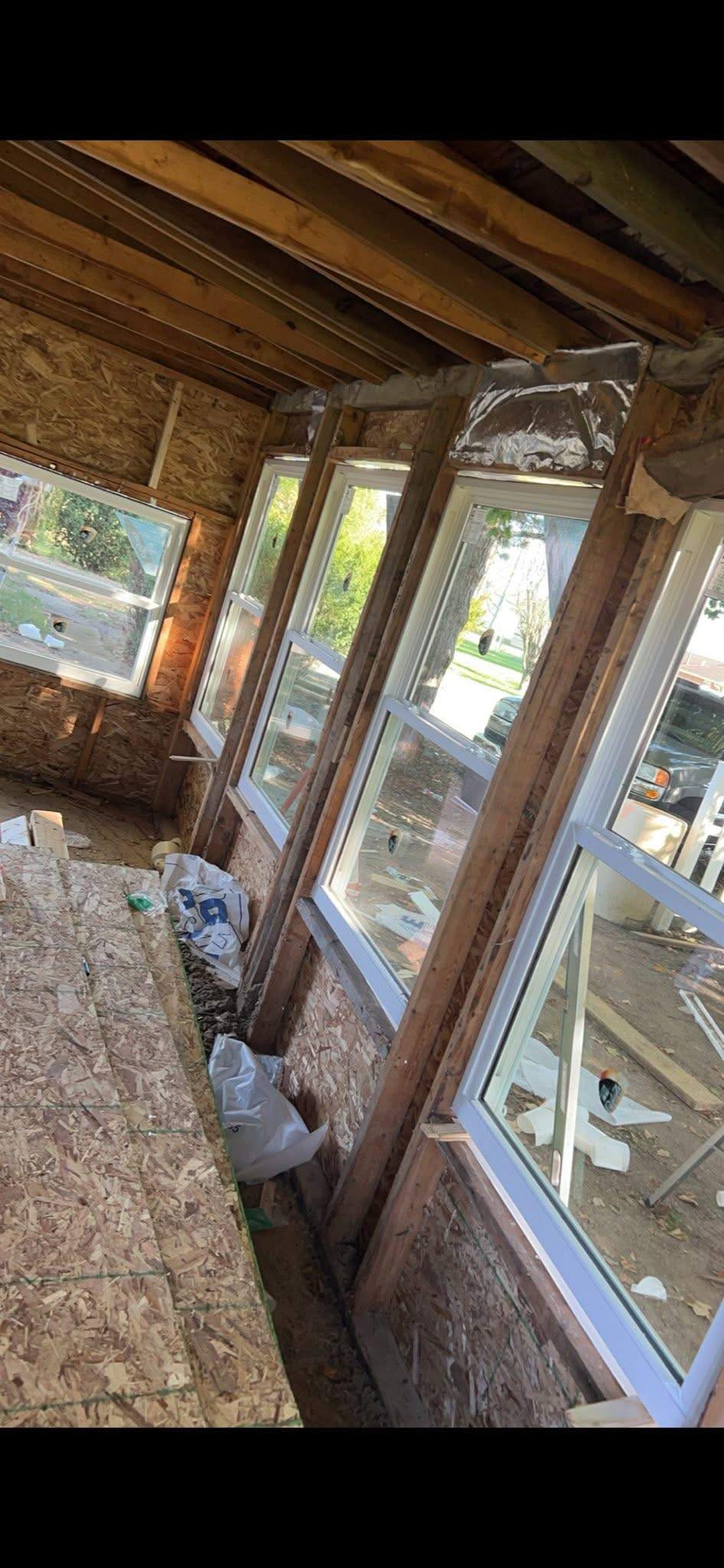 Interior framing and new windows during a home addition project